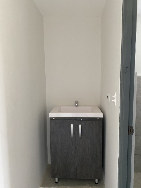 Compact bathroom with modern sink vanity corner house for rent Pacora Panama