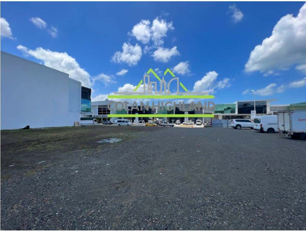 Secure main gated entrance of Panama Viejo Business Center complex with security booth