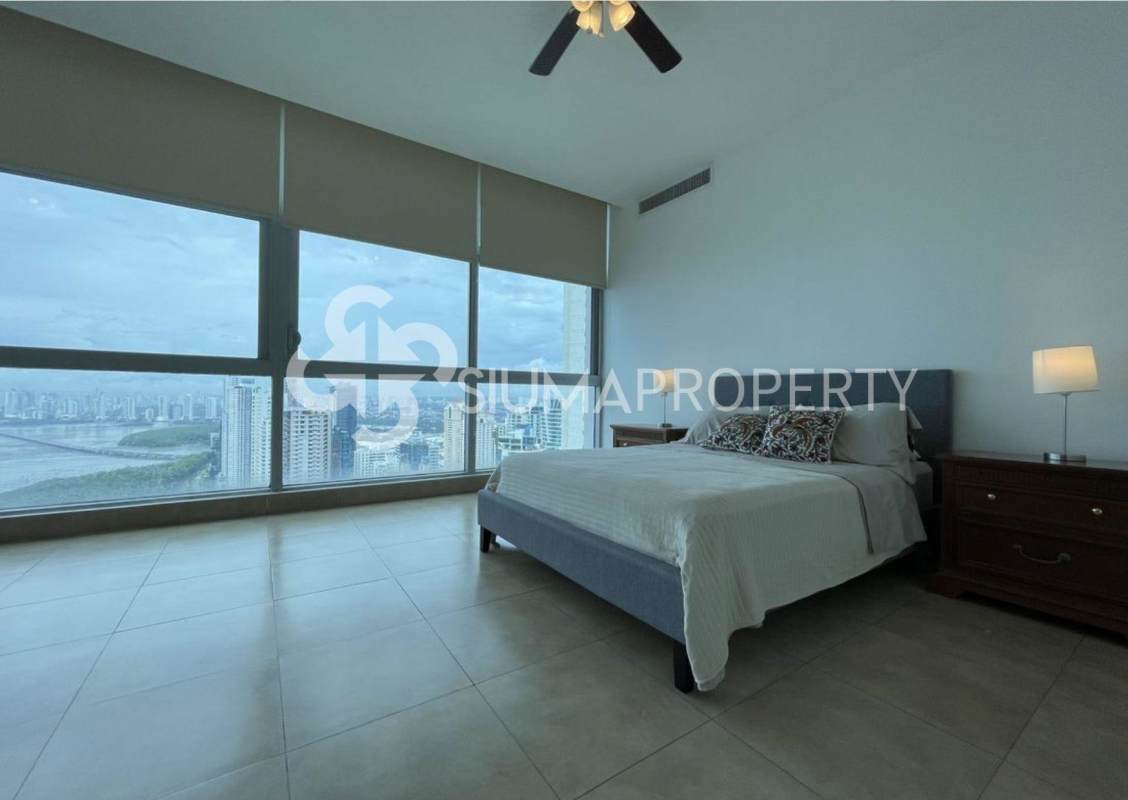 Master suite with floor-to-ceiling windows panoramic city & ocean view in Costa del Este