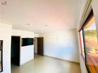 Open plan living and kitchen area with modern design Senderos de Bambú Nuevo Arraiján Panama