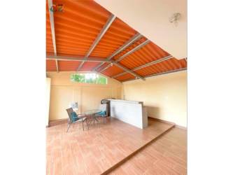 Covered patio with ceramic flooring and bar Senderos de Bambú Nuevo Arraiján Panama