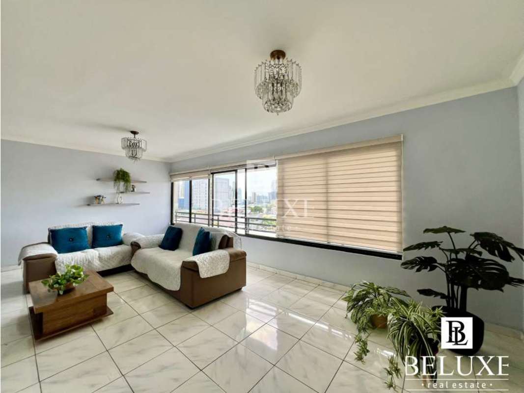 Spacious living room with tile floors, bright windows and comfortable sofas PH Country Park Panama
