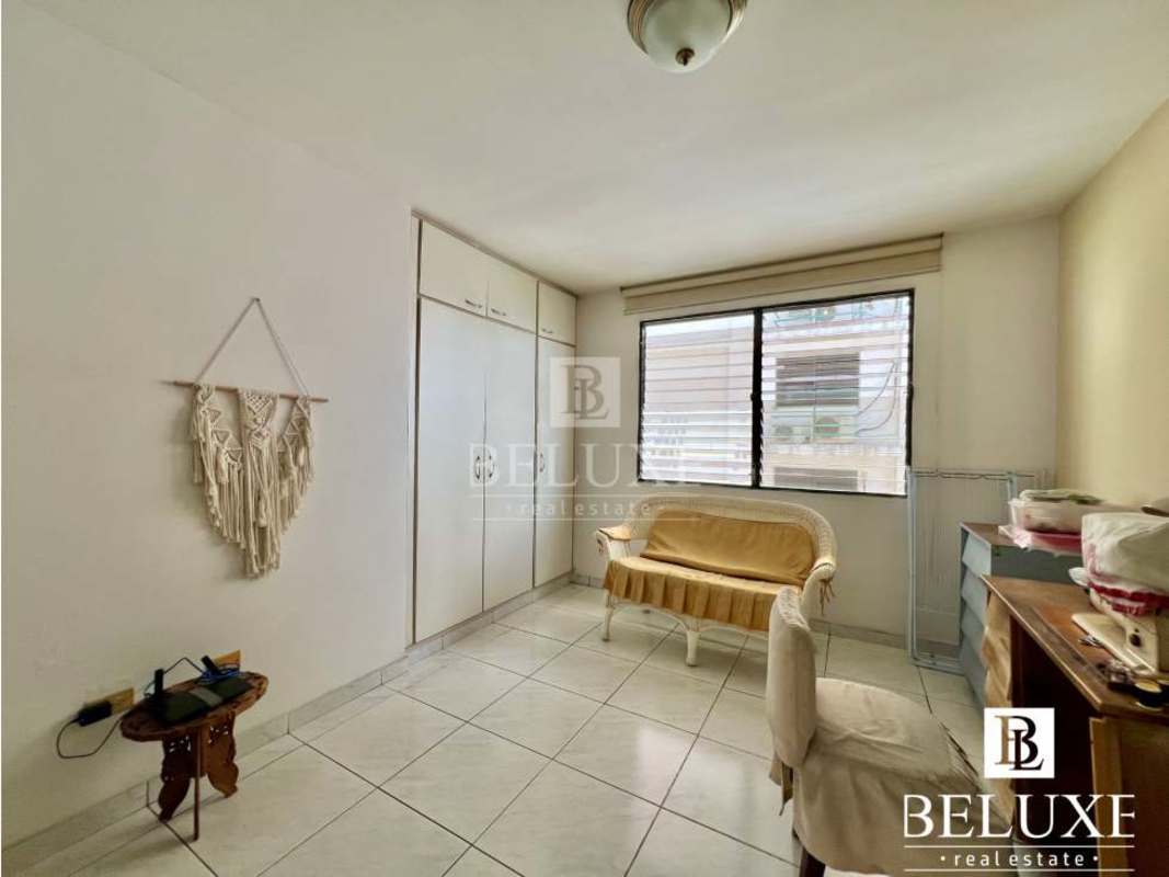 Large covered balcony with glass panels and skyline views PH Country Park San Francisco