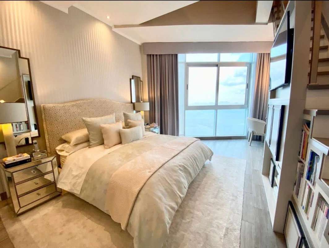 Elegant master bathroom with marble, soaking tub, glass shower at Pearl at the Sea Costa del Este Panama