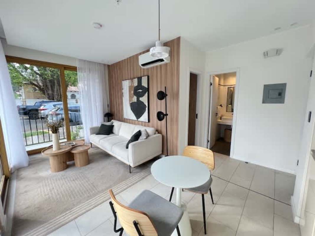 Minimalist kitchenette with black fixtures in Nook Bella Vista Panama