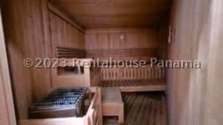 Bright open kitchen with granite countertops and views of the Pacific Ocean