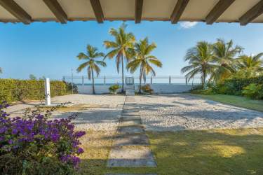 Large terrace with hammock and picnic table, ocean views at Farallon beachfront home