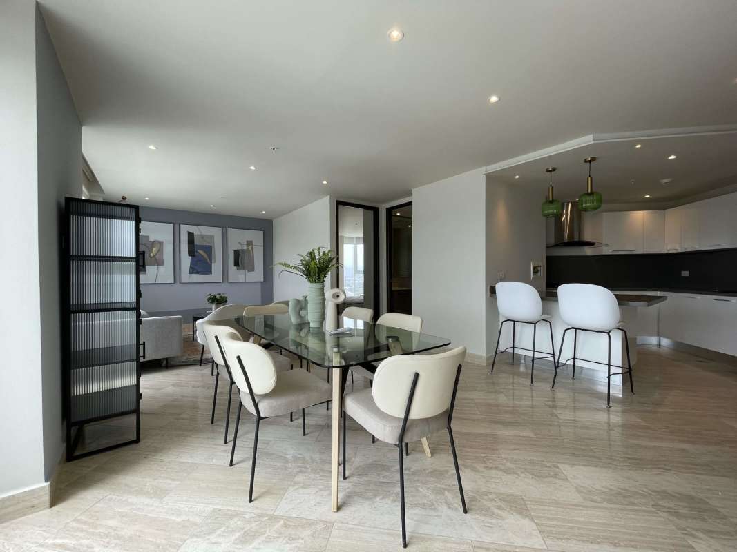 Open plan kitchen with granite countertops and breakfast bar PH The Regent Costa del Este Panama rental