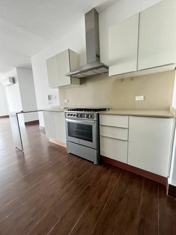 Bright bedroom in PH Costamare apartment with built-in closet and AC