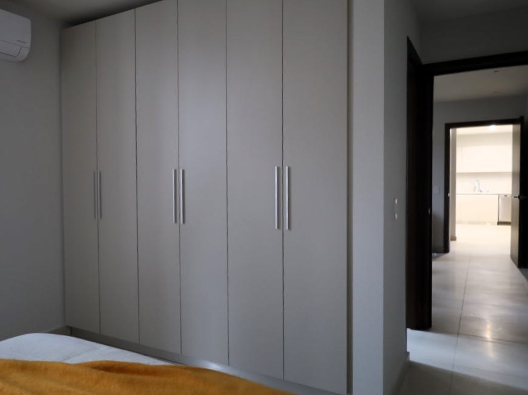 Clubhouse pools, sun deck, and gardens at PH Casa Bianca Costa del Este Panama