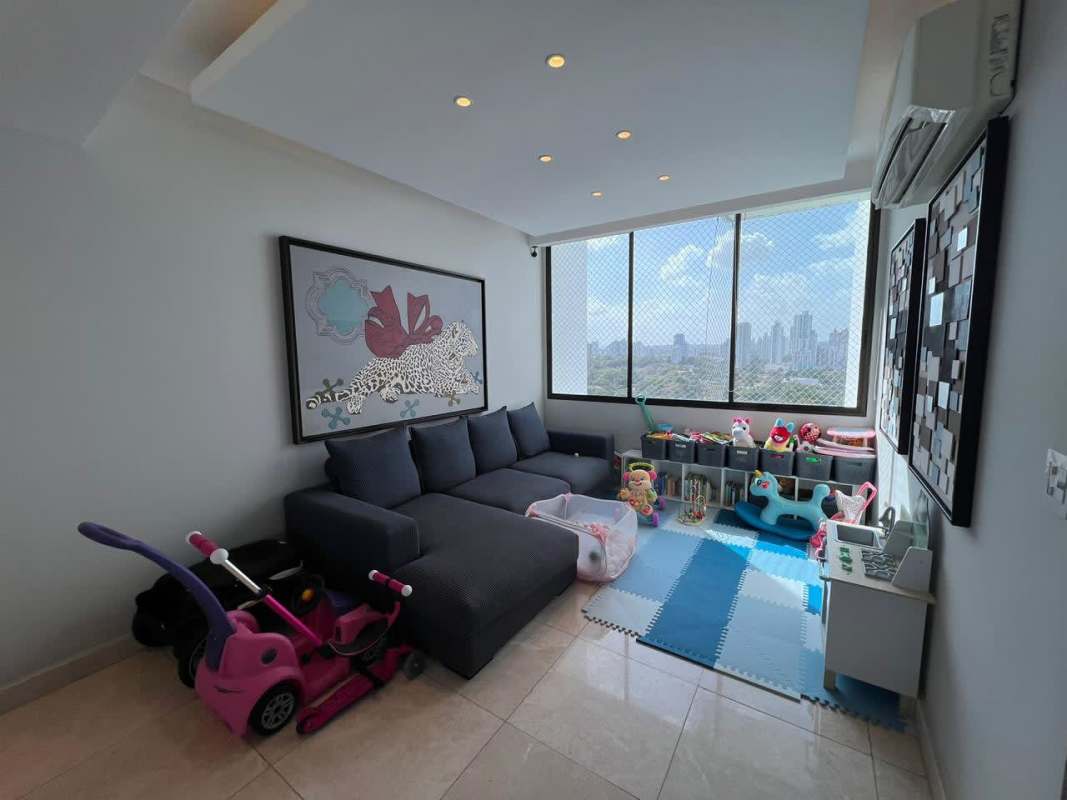 Open living-dining area with floor-to-ceiling windows showing Pacific Ocean in PH Dalmare Coco del Mar