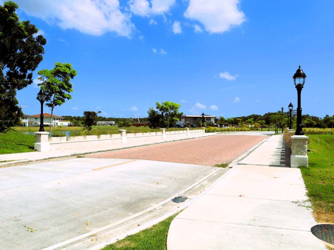 Golf course with nearby homes and trees Santa María Golf community Panama