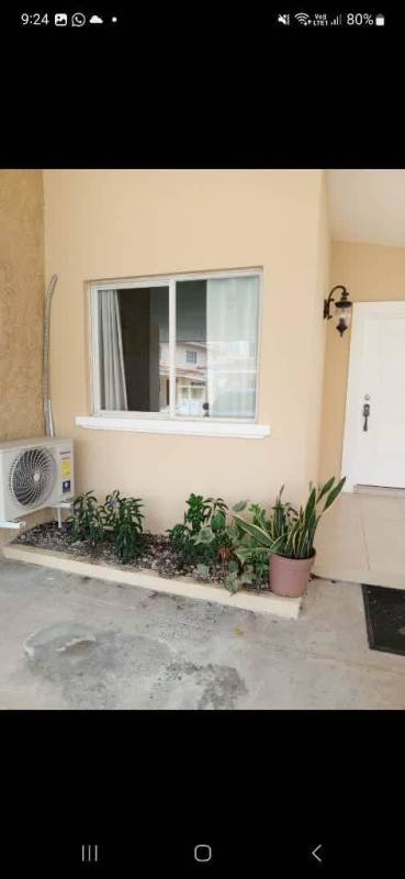 Front exterior of house with garden and AC PH Tivoli Brisas del Golf Panama