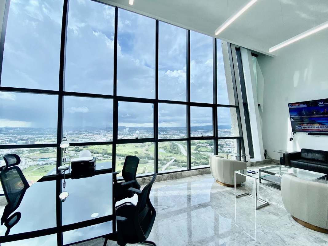 Spacious bright living room with marble floors and large windows Empire Residences Santa Maria Panama