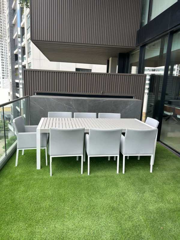 Elegant hallway with floating console, abstract colorful art, luxury condo Santa Maria Panama