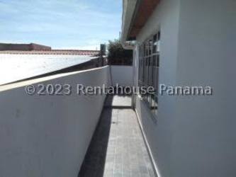 Spacious fenced backyard with greenery and tiled terrace La Chorrera Panama house