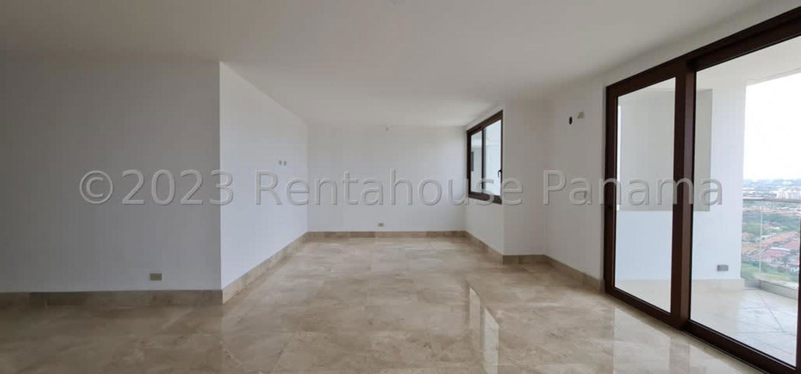 Modern bathroom with marble vanity double sinks glass shower in luxury apartment PH The Colonial Panama