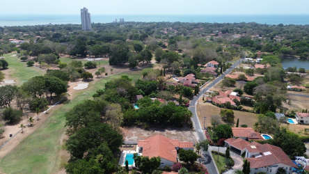 Private pool and covered terrace surrounded by lush landscaping Coronado Panama