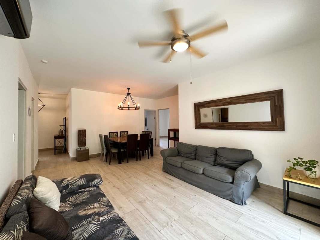 Custom walk-in closet with shelving, drawers and hanging rods in PH Albrook Park Panama