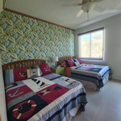 Fully equipped kitchen with wood cabinets and appliances Bijao Panama