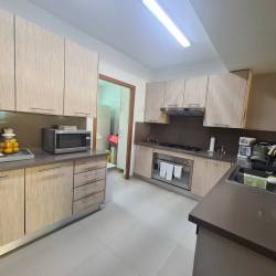 Bedroom with twin beds, tropical decor, ceiling fan Bijao Beach Club Panama