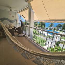 Balcony terrace with hammock overlooking ocean Bijao Beach Panama furnished rental