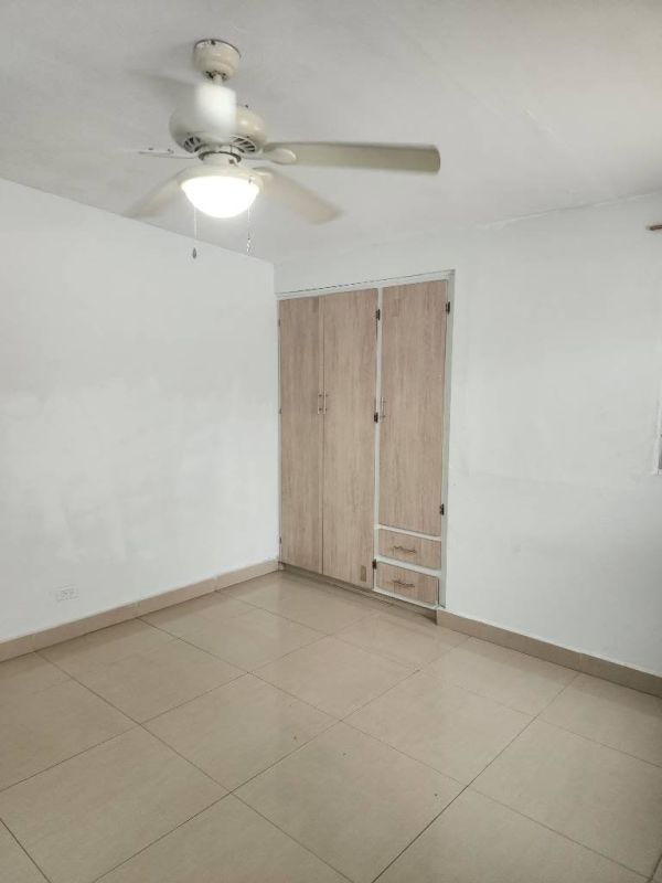 Bathroom featuring granite countertop vanity and wall mirror in updated home Los Harinos Hato Pintado Panama City