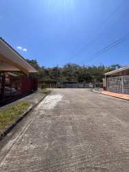 Fenced driveway and yard area at Brisas de Arraiján house Panama