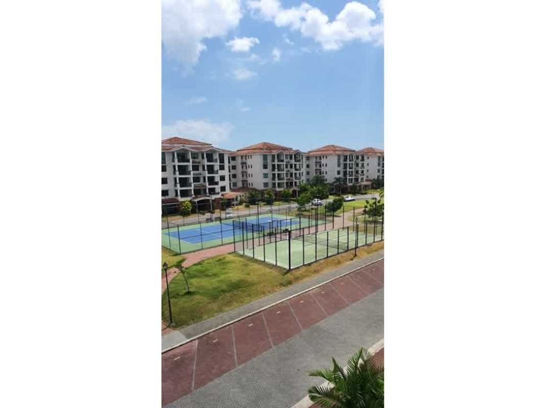 Residential buildings with tennis courts and green landscaped areas in PH Costa Mare Costa del Este Panama