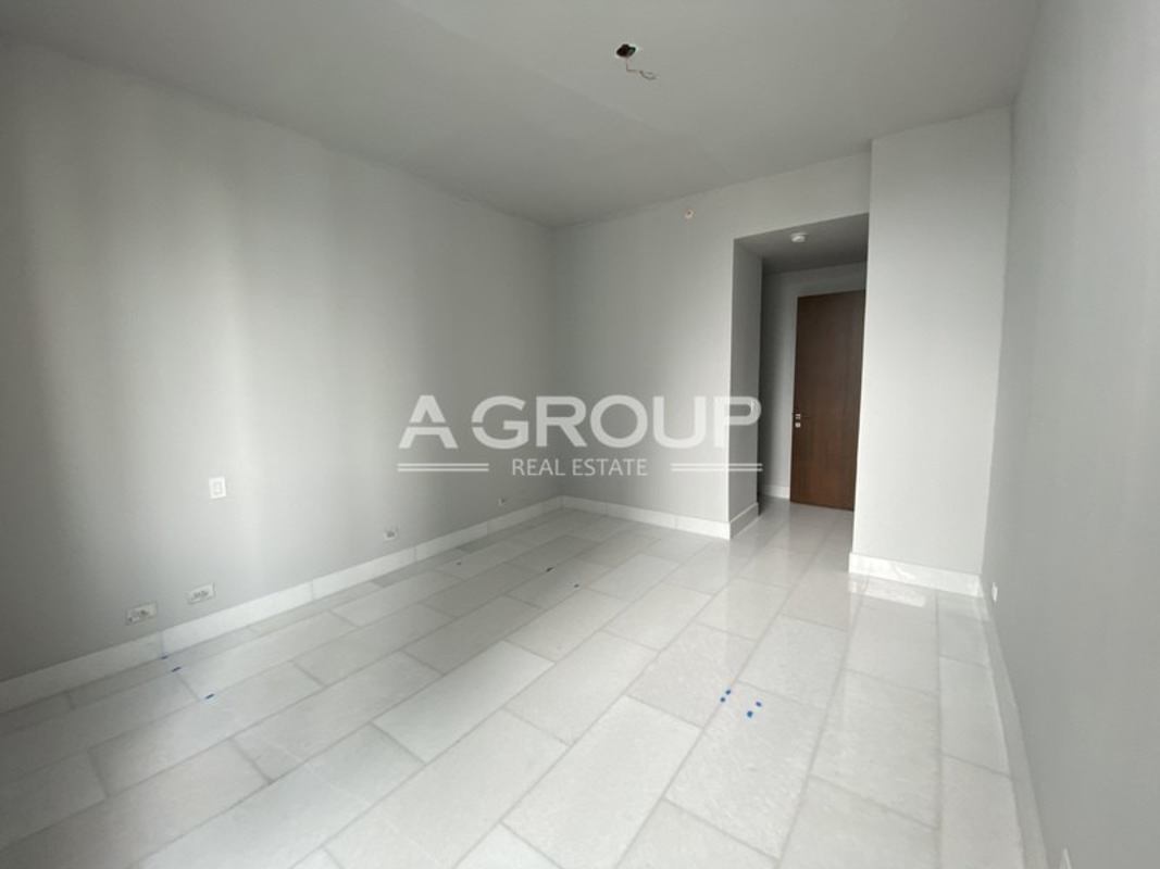 Luxurious lobby with marble desk, gold accents in PH The Towers Punta Paitilla Panama City