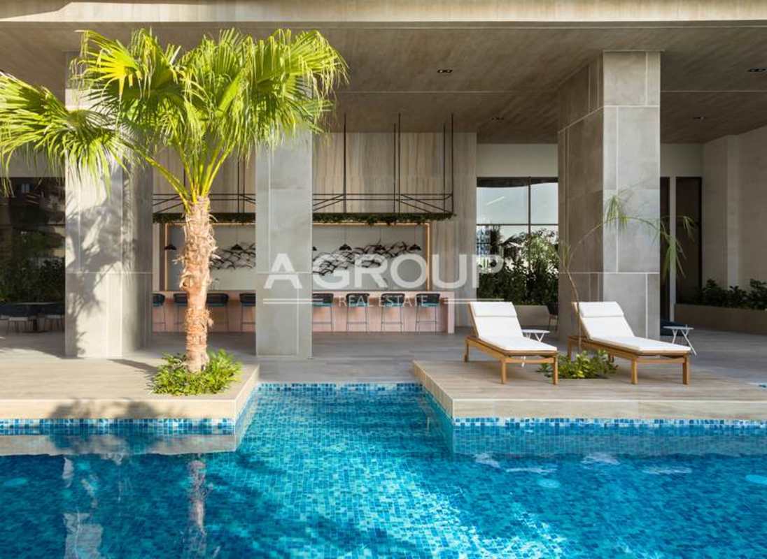 Spa indoor plunge pool with mosaic design and sunset view PH The Towers Punta Paitilla Panama City