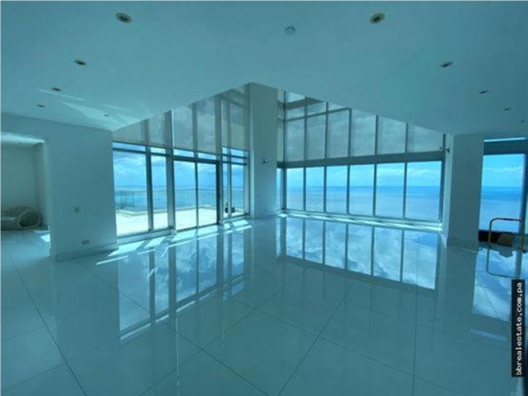 Luxury kitchen featuring spacious island, stainless appliances, ample cabinetry in PH Ten Tower penthouse