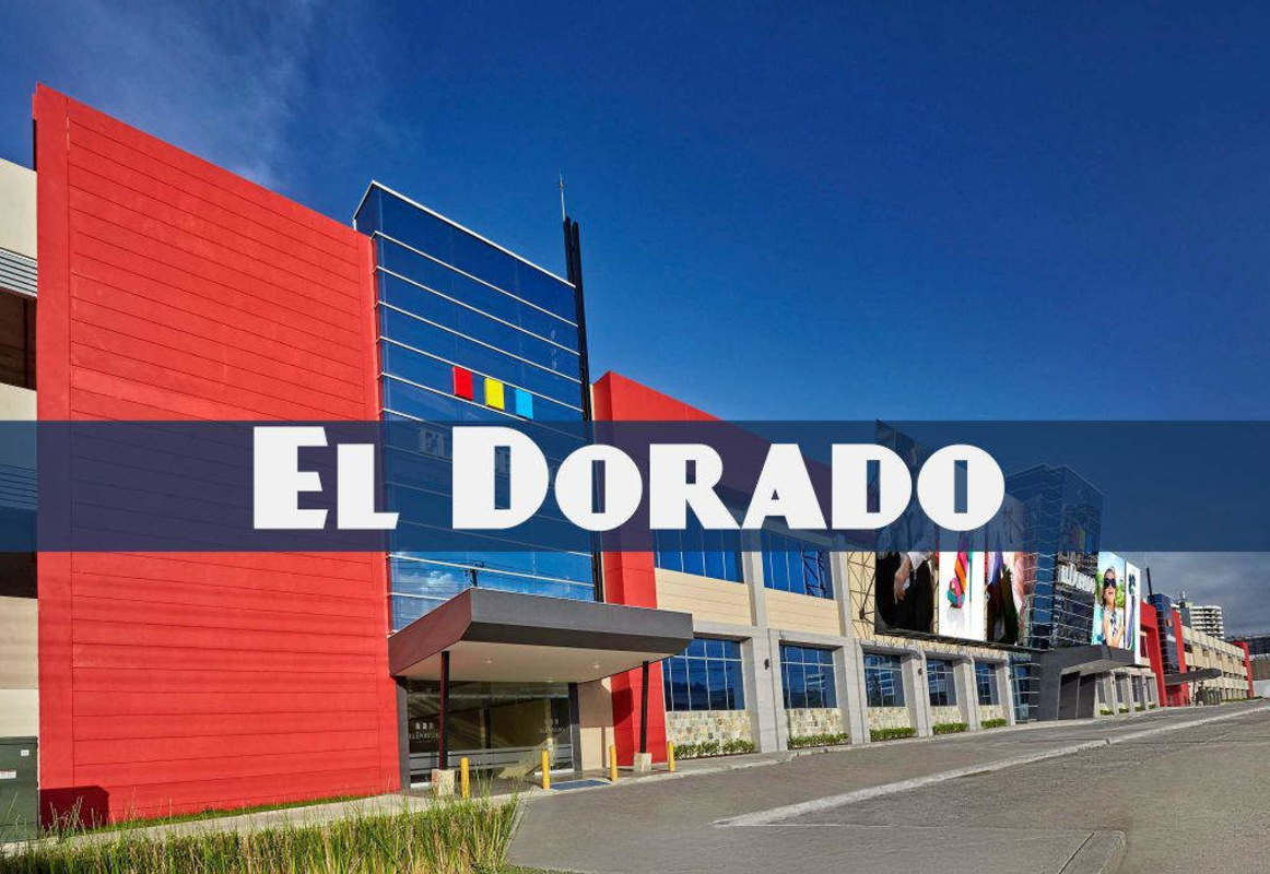 Modern exterior of Dorado Mall with colorful panels and glass windows in Panama City