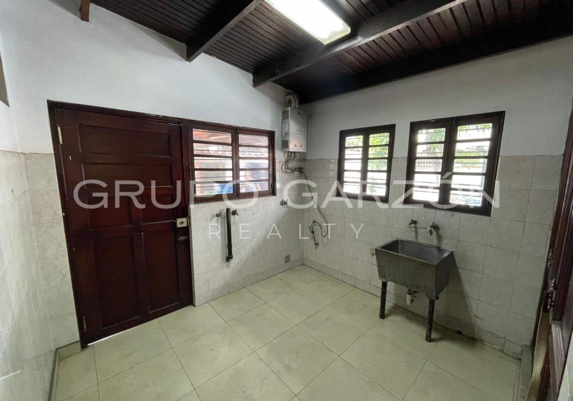 Covered balcony terrace colonial house garden view Altos del Golf San Francisco Panama