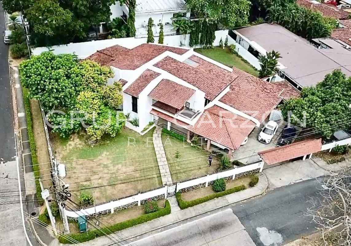 Spacious kitchen with wood cabinets granite counters stainless appliances Altos del Golf house Panama