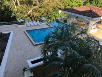 Luxury Mediterranean style pool area with sun loungers, garden and pavilion Eagles Landing Panama