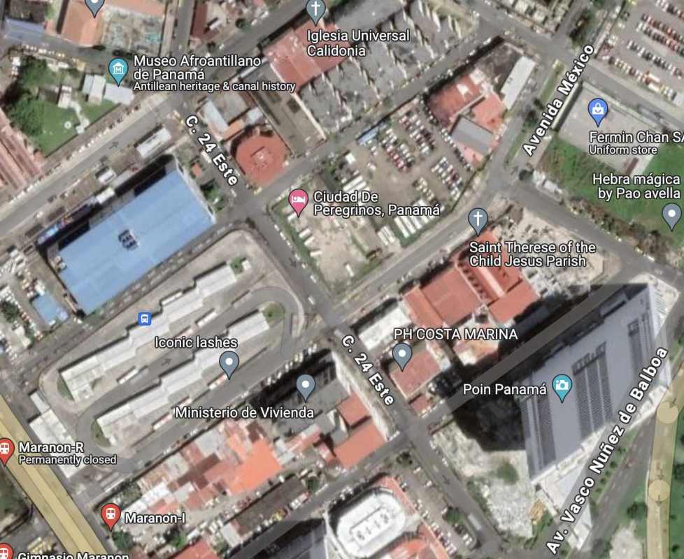 Aerial of central Panama City commercial and residential mix near transit and highways with development plot highlighted