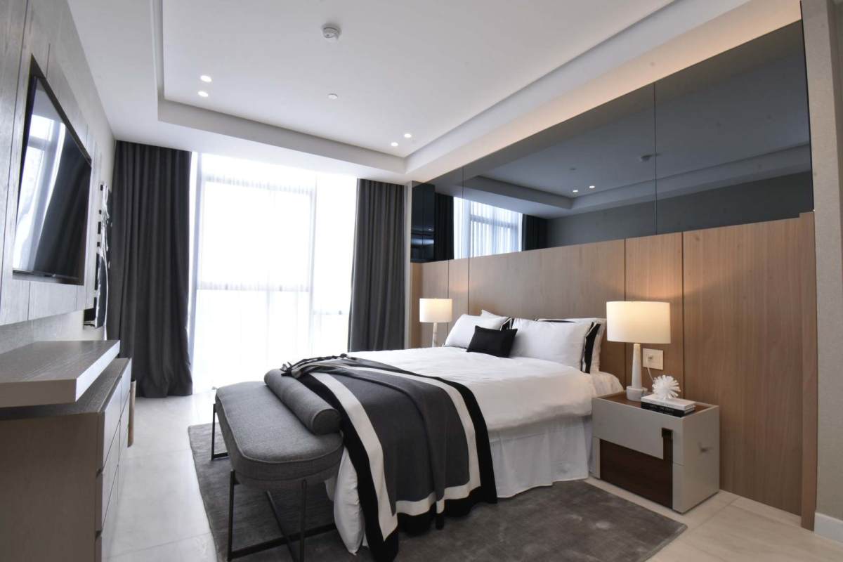 Contemporary master bedroom with golf course views La Maison by Fendi Casa Panama