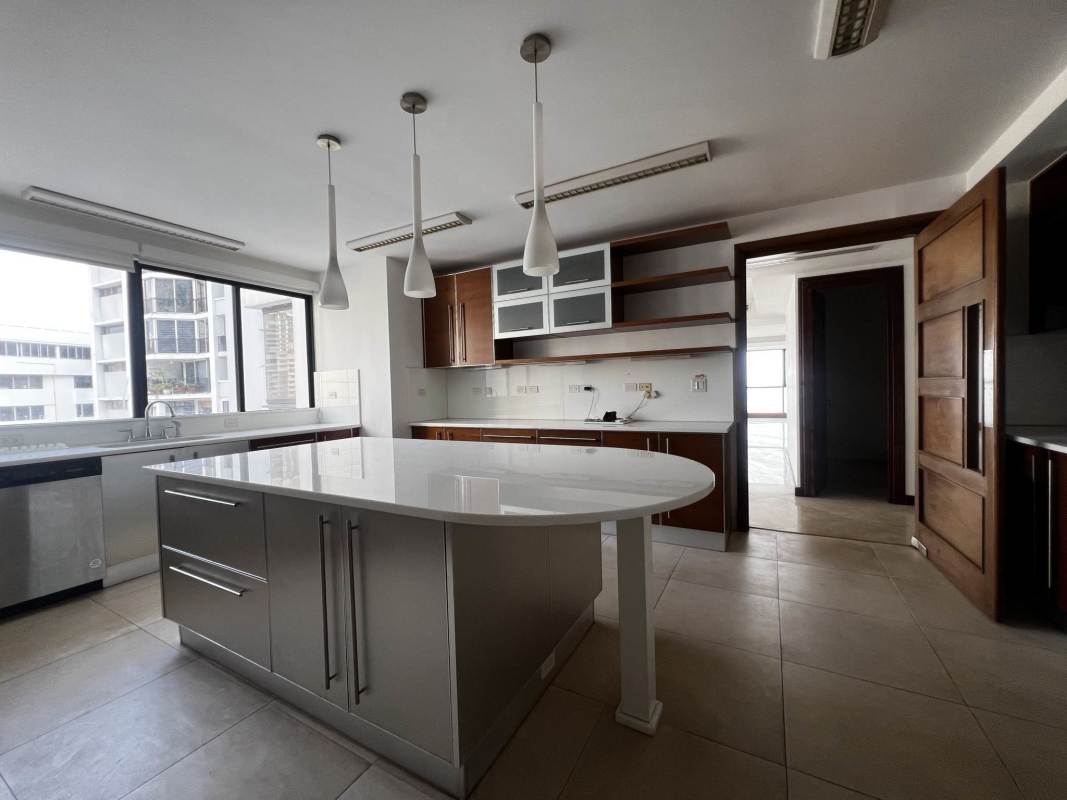 Double vanity marble bathroom with large mirrors and high-end fixtures