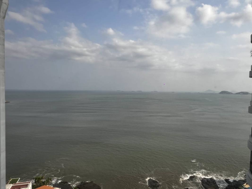 Ocean and city views from balcony at PH Punta del Sol