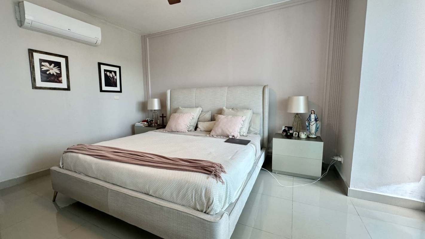 Contemporary bathroom with glass shower and granite vanity in PH Grecia Panama City
