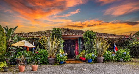 Mediterranean style guest cabin with vibrant garden for rent or hotel stay in Boquete Panama