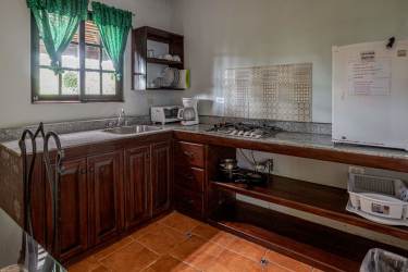 Spanish colonial style terraces with mountain backdrop at Alto Boquete hotel property Panama