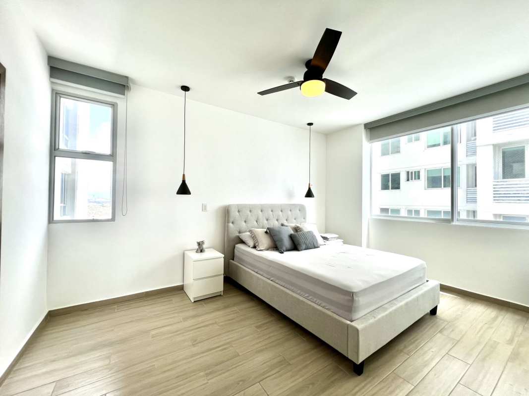 Modern bathroom double vessel sinks glass shower tiled Costa del Este apartment PH Maui