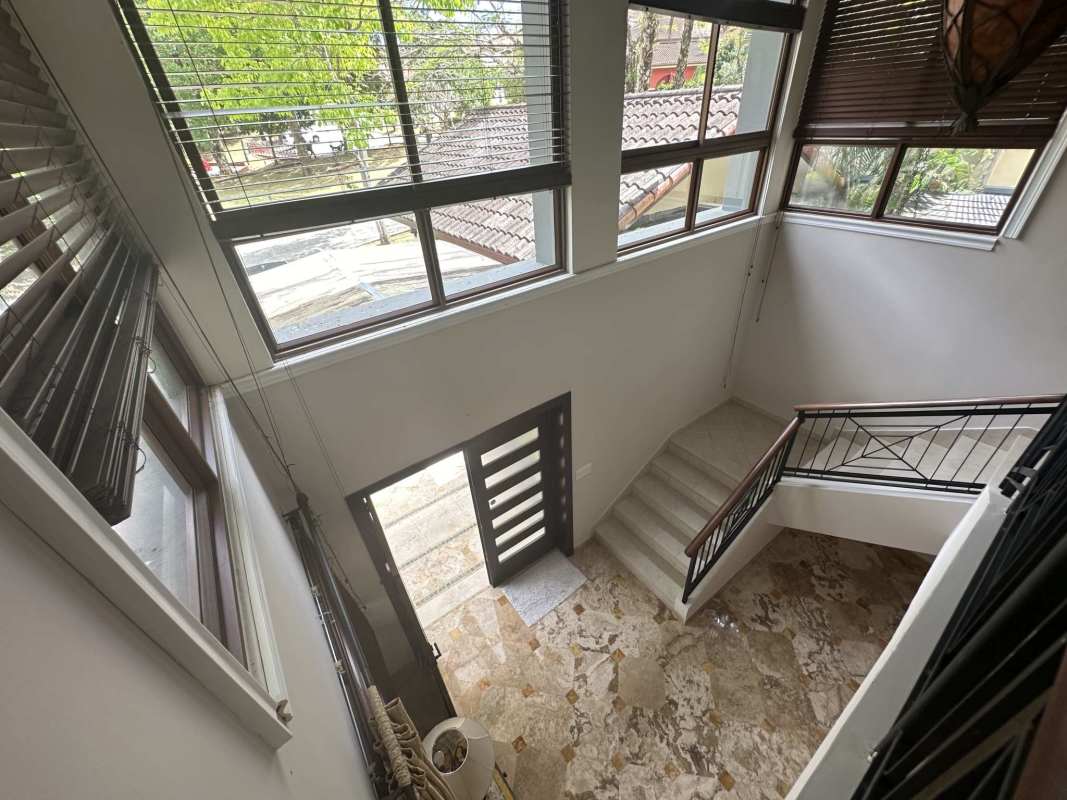 Spacious modern kitchen with granite countertops, stainless appliances in luxury house Panama