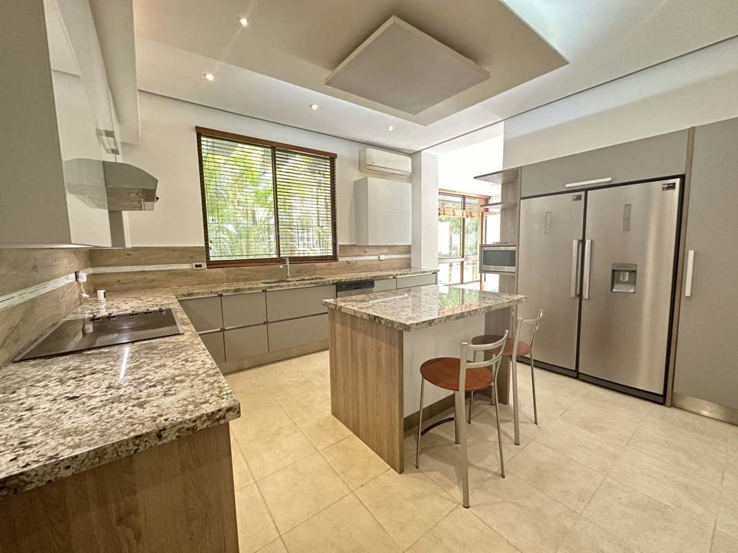 Bedroom with large windows garden view luxury home Panama