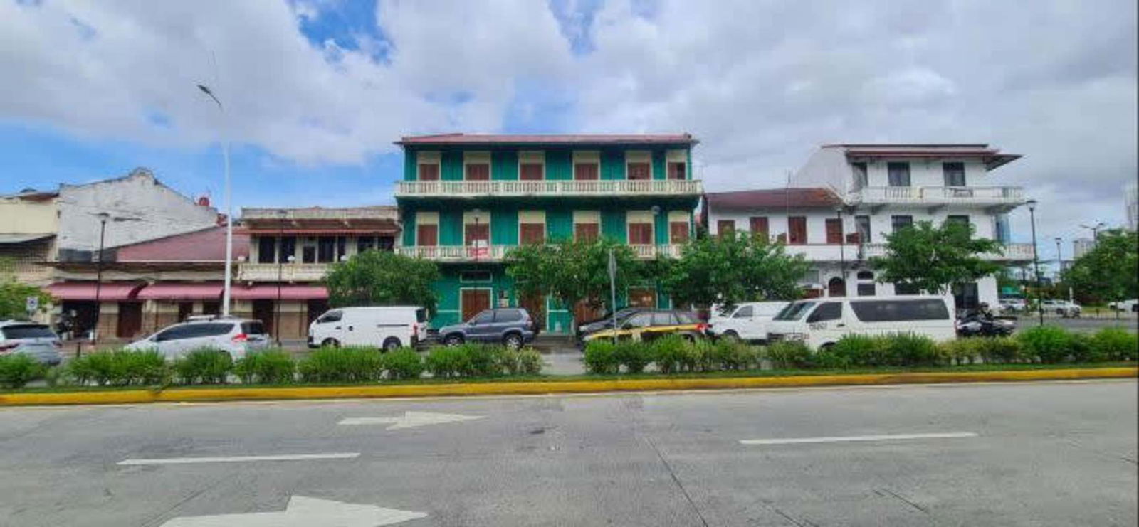Historic colonial facades with balconies along vibrant Casco Viejo street Panama