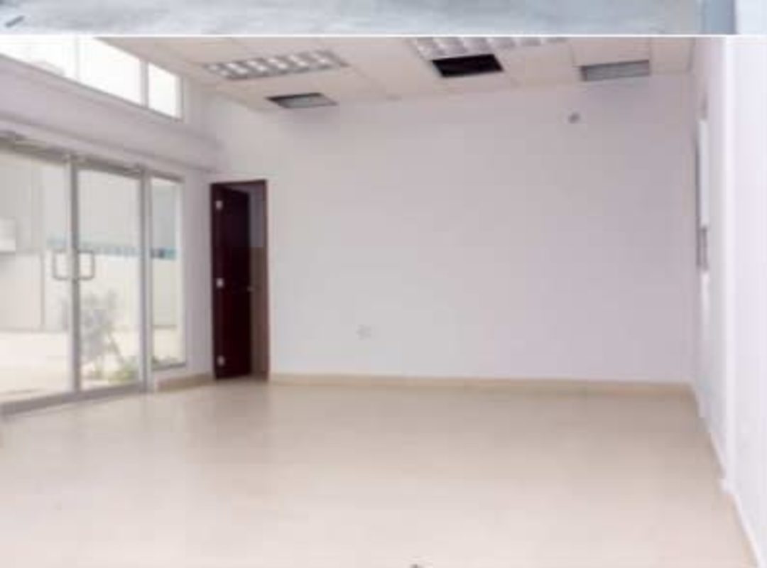 Empty industrial warehouse with steel beams, concrete floor, LED lighting in Las Mañanitas Tocumen Panama