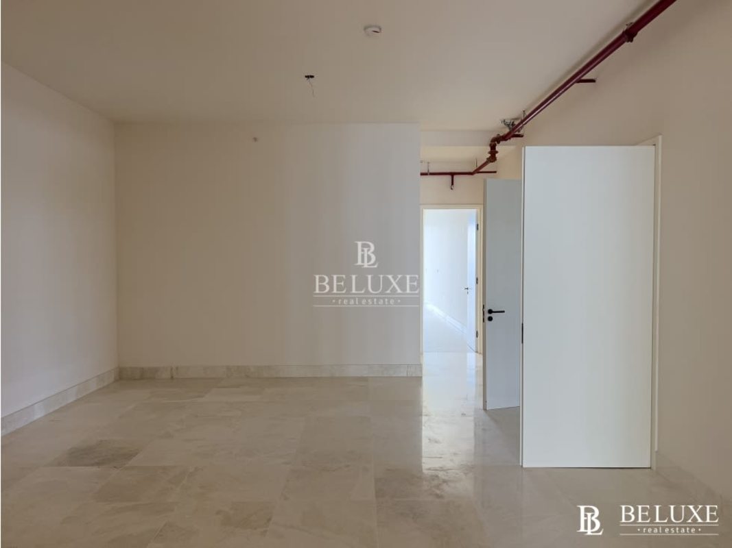 Contemporary bathroom with double-sink vanity and glass shower enclosure in PH Waterfront 21 Ocean Reef