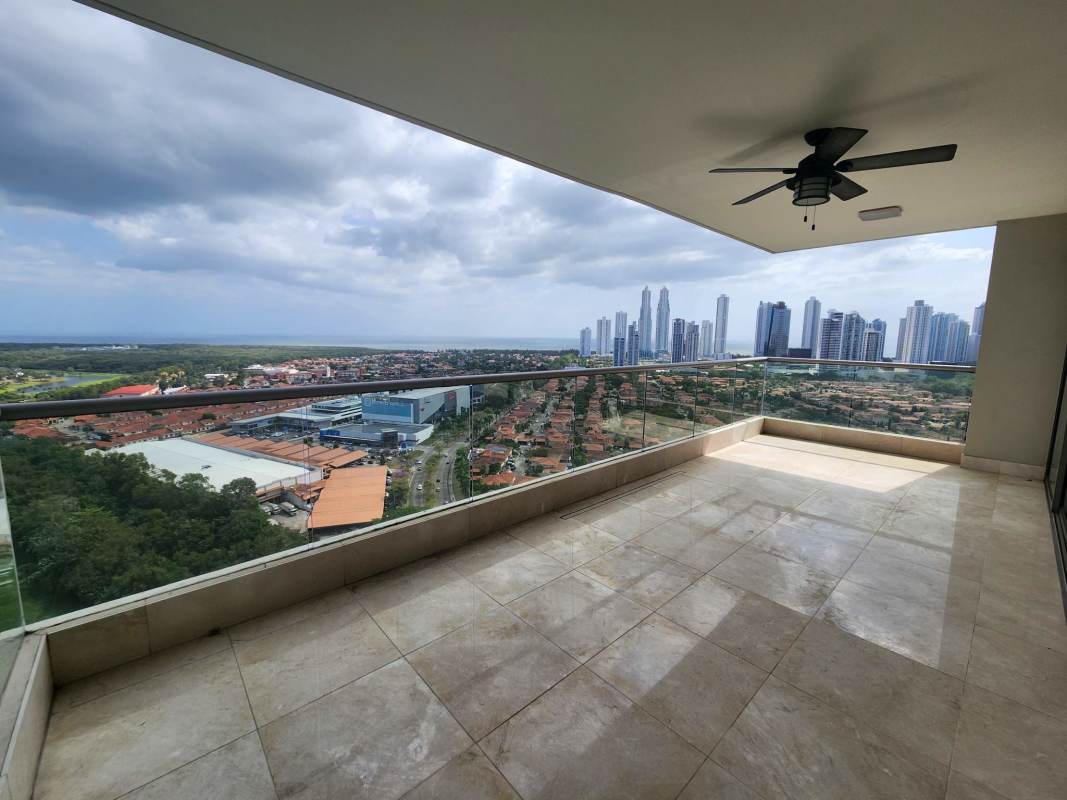 Modern bright living room with marble floors, golf and city view balcony at Green Garden Santa María Panama